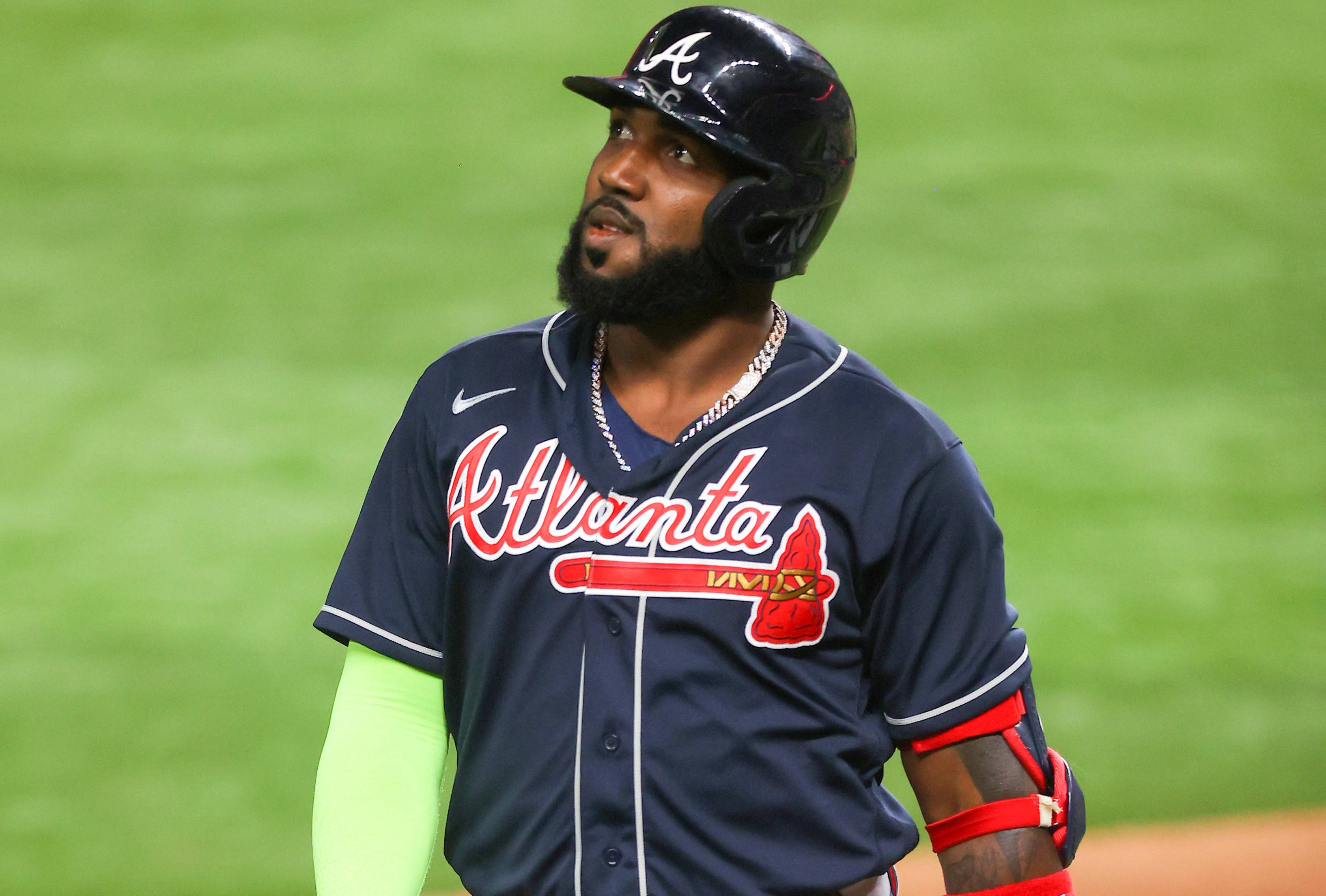 ARLINGTON, TEXAS - OCTOBER 18:  Marcell Ozuna #20 of the Atlanta Braves flies out against the Los Angeles Dodgers during the third inning in Game Seven of the National League Championship Series at Globe Life Field on October 18, 2020 in Arlington, Texas. (Photo by Ronald Martinez/Getty Images)