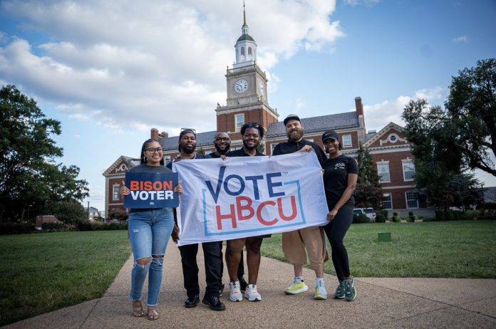 Students holding HBCU sign