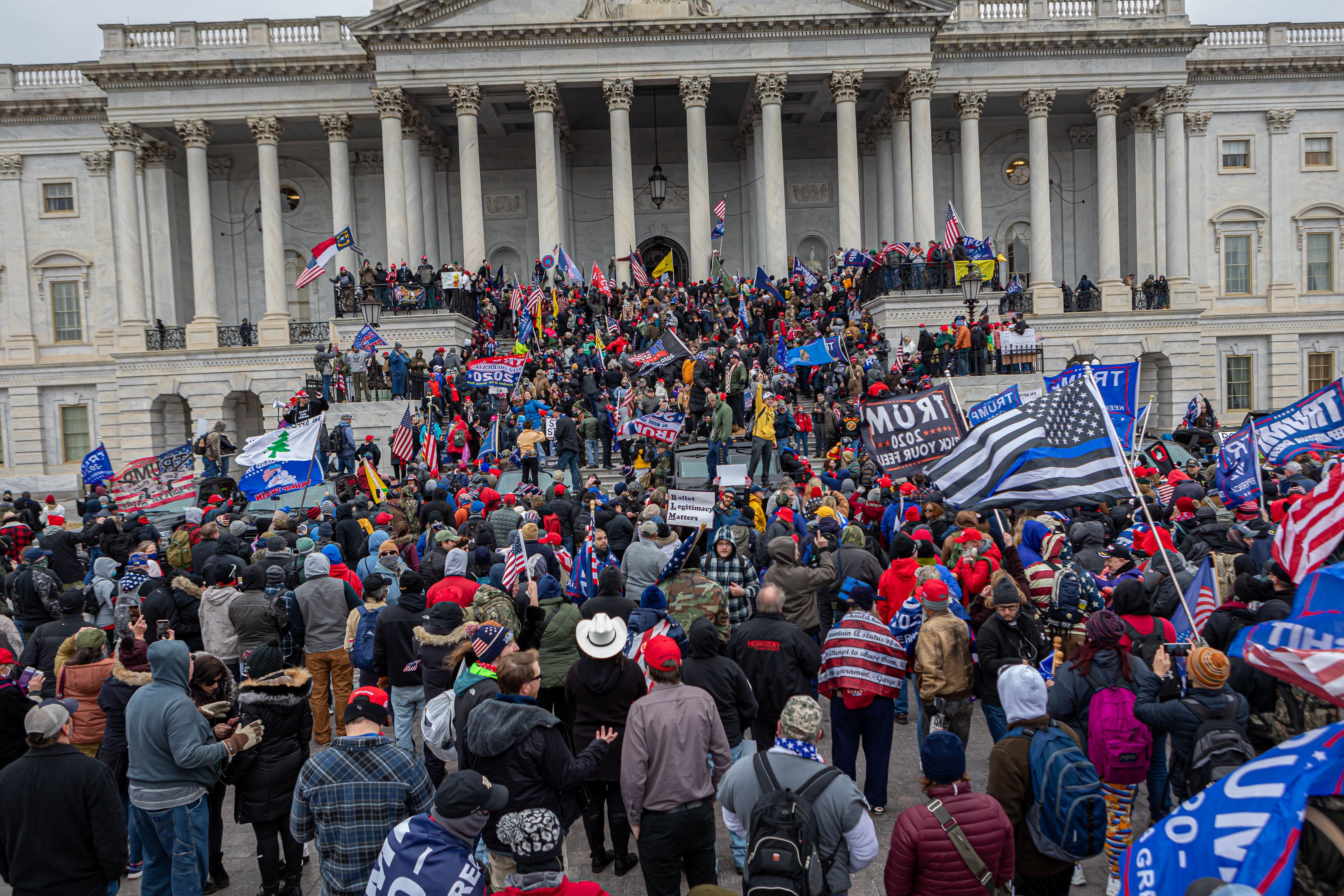 WASHINGTON DC, DISTRICT OF COLUMBIA, UNITED STATES - 2021/01/06: Pro-Trump supporters and far-right forces flooded Washington DC to protest Trump's election loss. Hundreds breached the U.S. Capitol Building, aproximately 13 were arrested and one protester was killed. (Photo by Michael Nigro/Pacific Press/LightRocket via Getty Images)