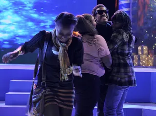 Loving his fans. - Lloyd encourages fans to join him onstage while performing during the A Very BET Christmas special. (Photo: John Ricard / BET)