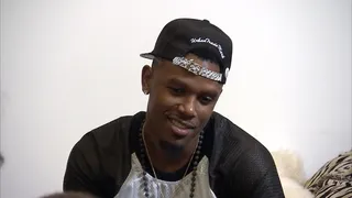 Proud Dad - Daniel watches as his son learns to play the piano.   (Photo: BET)