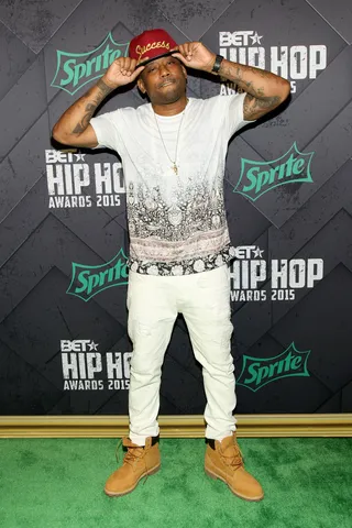 Thug Life - Rapper Maino keeps it gutta on the green carpet! Nothin like a little gangsta flavor! (Photo: Bennett Raglin/BET/Getty Images for BET Networks)