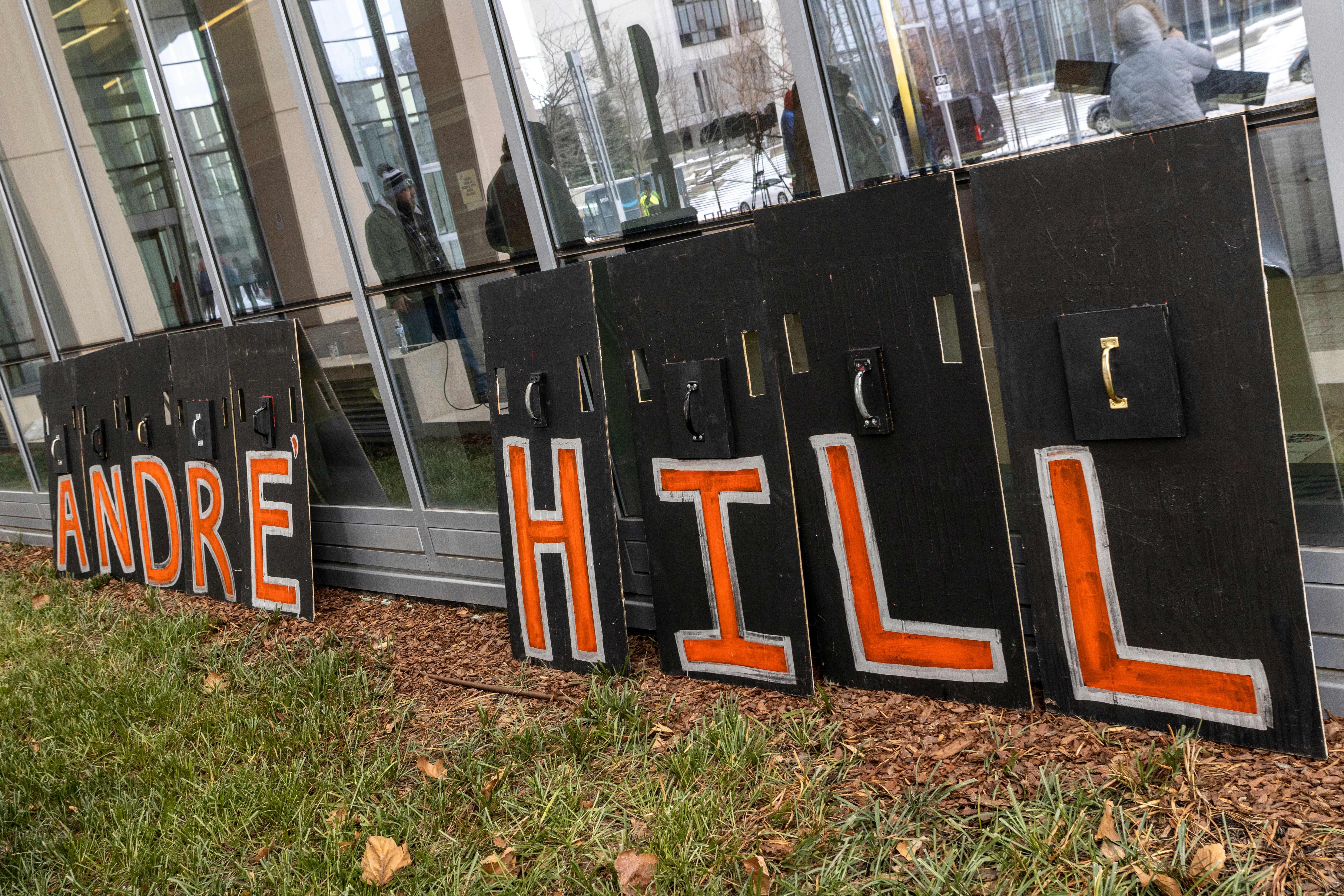 Signs spelling "Andre Hill" sit outside the Franklin County Common Pleas Courthouse after the arraignment of Adam Coy, the former Columbus Police officer who shot and killed Andre Hill, in Columbus, Ohio on February 5, 2021. - A former policeman has been charged with murder for the shooting death of an unarmed Black man in the US state of Ohio. The killing of Andre Hill shortly before Christmas in the city of Columbus sparked a new wave of protests in the United States against police brutality towards African Americans. (Photo by STEPHEN ZENNER / AFP) (Photo by STEPHEN ZENNER/AFP via Getty Images)