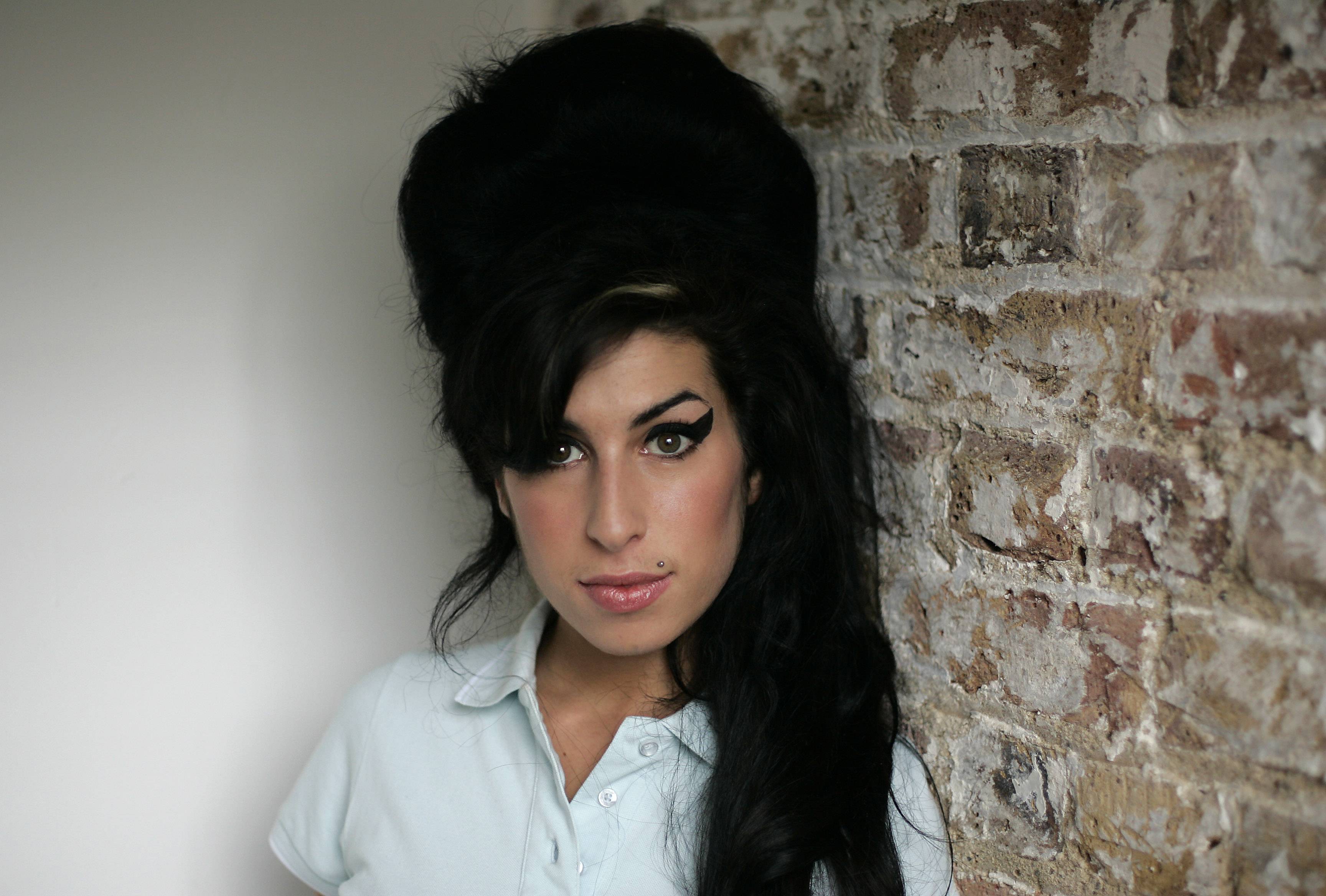 Worst: Amy Winehouse Dies - She had been teetering on the brink of destruction for years, but when Amy Winehouse finally succumbed to her demons on July 23, at the young age of 27, the world lost one of the greatest talents of this generation. After weeks of speculation, a coroner confirmed that Winehouse died of alcohol poisoning.&nbsp;(Photo: AP Photo/Matt Dunham)