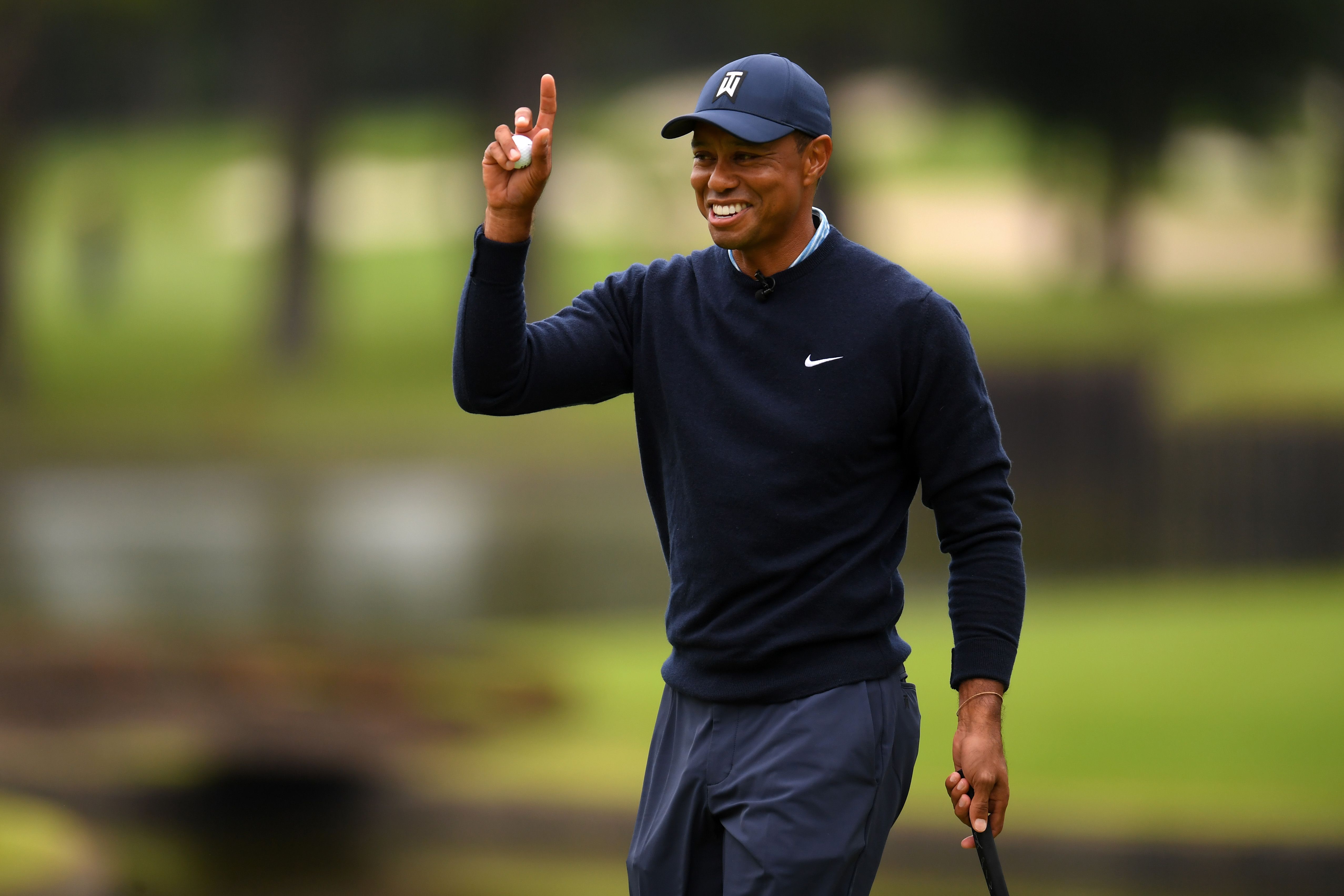 INZAI, JAPAN - OCTOBER 21: Tiger Woods of the United States celebrates on the 6th green during The Challenge: Japan Skins at Accordia Golf Narashino Country Club on October 21, 2019 in Inzai, Chiba, Japan. (Photo by Atsushi Tomura/Getty Images)