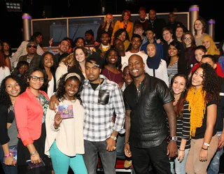 Holding Weight! - Nas and Tyrese pose for pictures with the audience on 106. (Photo: Bennett Raglin/BET/Getty Images for BET)