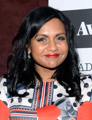 Mindy Kaling - Funny gal Mindy Kaling opts for dramatic lashes and a crimson lip to complement her lustrous black strands.   (Photo: Araya Diaz/Getty Images for Awardsline/Deadline)