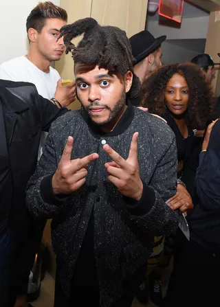 What's Up, World? - The Weekend&nbsp;says peace at the Rihanna Party at the New York Edition in New York City.(Photo: Michael Loccisano/Getty Images for EDITION)