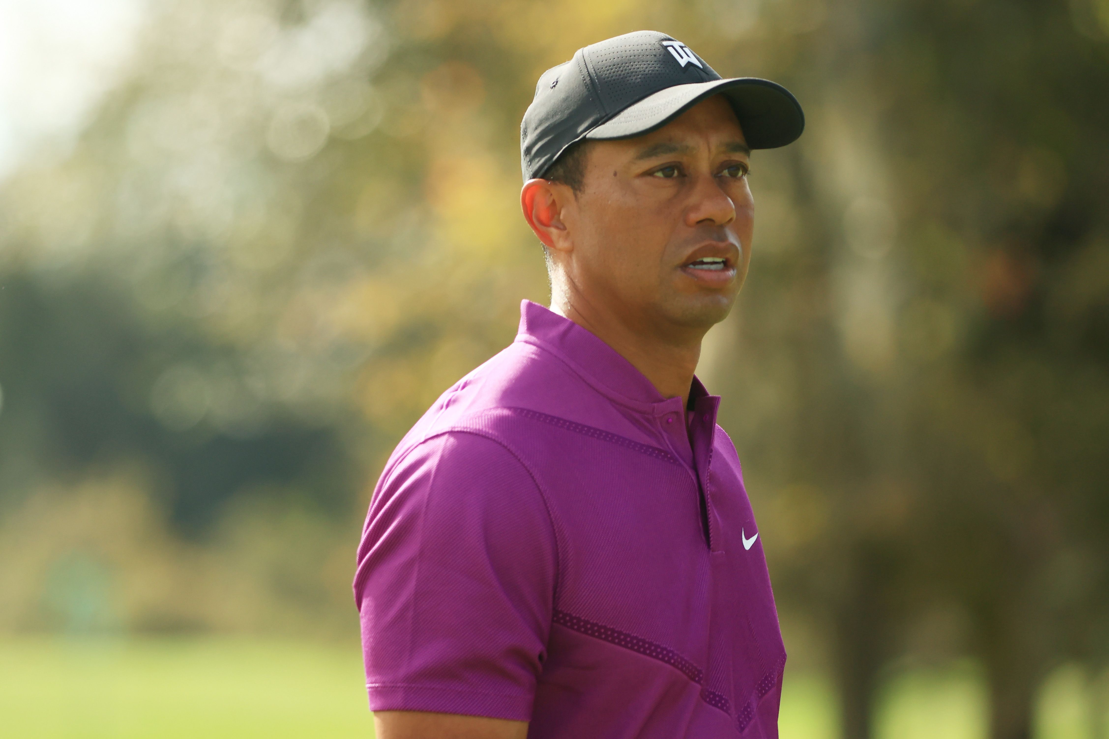 ORLANDO, FLORIDA - DECEMBER 19: Tiger Woods of the United States looks on from the range during the first round of the PNC Championship at the Ritz-Carlton Golf Club Orlando on December 19, 2020 in Orlando, Florida. (Photo by Mike Ehrmann/Getty Images)