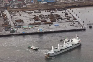 Tomakomai pier in Hokkaido is submerged after a ferocious tsunami unleashed by Japan's biggest recorded earthquake slammed into its eastern coasts. (Photo: AP Photo/Kyodo News)