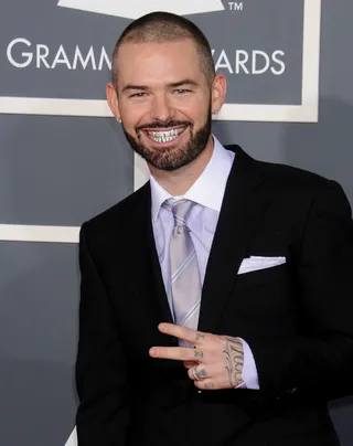 Paul Wall (@paulwallbaby) - Southern rapper Paul Wall shut down rumors that he had signed to YMCMB. The Twitter-verse was going nuts with the news that Cash Money had added him to the team. Paul said he was still independent and hadn't signed anything... &quot;yet&quot;&nbsp;TWEET: &quot;My momma just ask me if I signed with Young Money.....&quot;&nbsp;(Photo: Gregg DeGuire/PictureGroup)