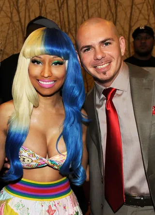 In Living Color\r - Rappers Pitbull and Nicki Minaj announce the 2011 American Music Awards Nominees Press Conference at the JW Marriott Los Angeles at L.A. LIVE. The pair both received two nominations each for their work this year.&nbsp; (Photo: Kevin Winter/Getty Images)