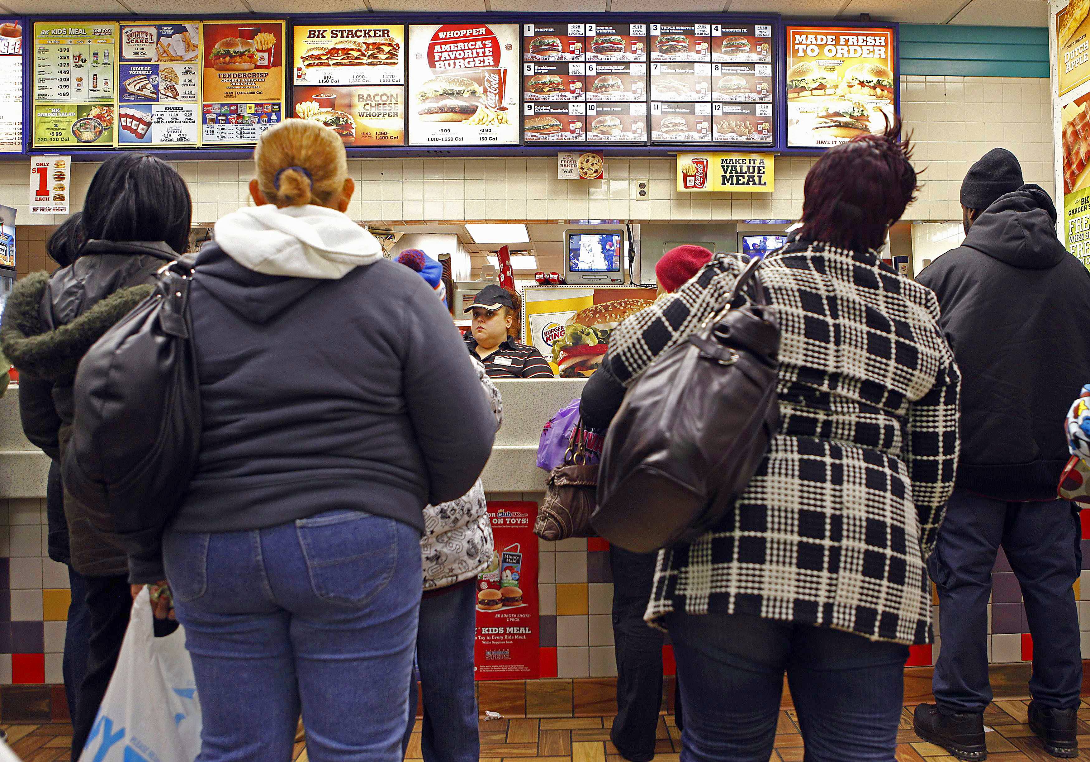 Doing a Body Good? - Have you fallen off the healthy-eating bandwagon? Fewer Americans reported eating healthily in 2011 than one year earlier, says a Gallup poll released on April 11. When asked if they ate healthily the day before, 68 percent of people in 2010 said they did compared to 66 percent in 2011. There’s also a slight decrease in Americans who eat the recommended five or more servings of fruits and vegetables each day (57 percent in 2010 compared to 56 percent, respectively).(Photo: REUTERS/Finbarr O'Reilly)