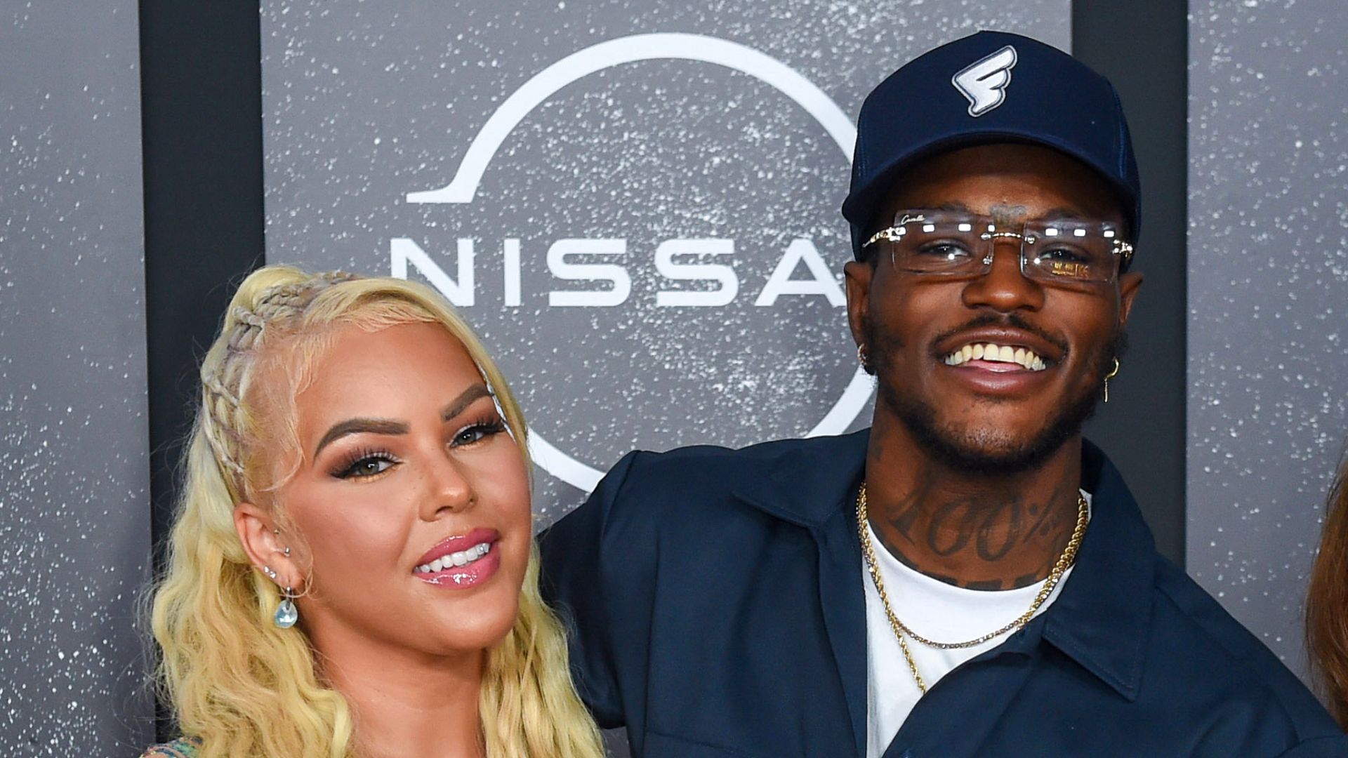 Jacky Oh and DC Young Fly arrive to the 2021 BET Hip Hop Awards at Cobb Energy Performing Arts Centre on October 01, 2021 in Atlanta, Georgia. 