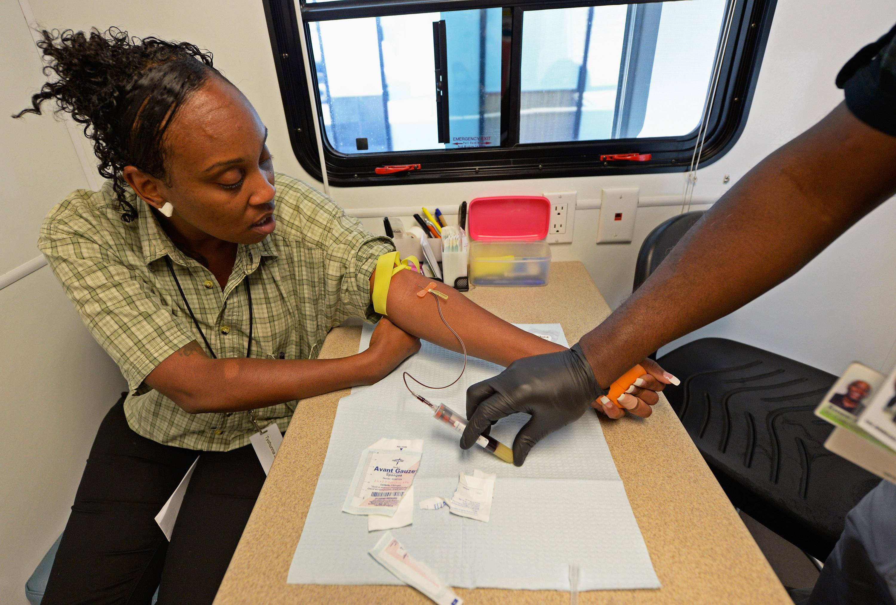 woman at clinic drawing blood