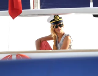 Captain Rih - Rihanna relaxes on a yacht while visiting Istanbul. The pop star playfully posted an image on Instagram with the message: "Rolled up to my show on a yacht!#imjustdifferent&nbsp;#diamondsworldtour#ISTANBUL." (Photo: Seskim/WENN.com)