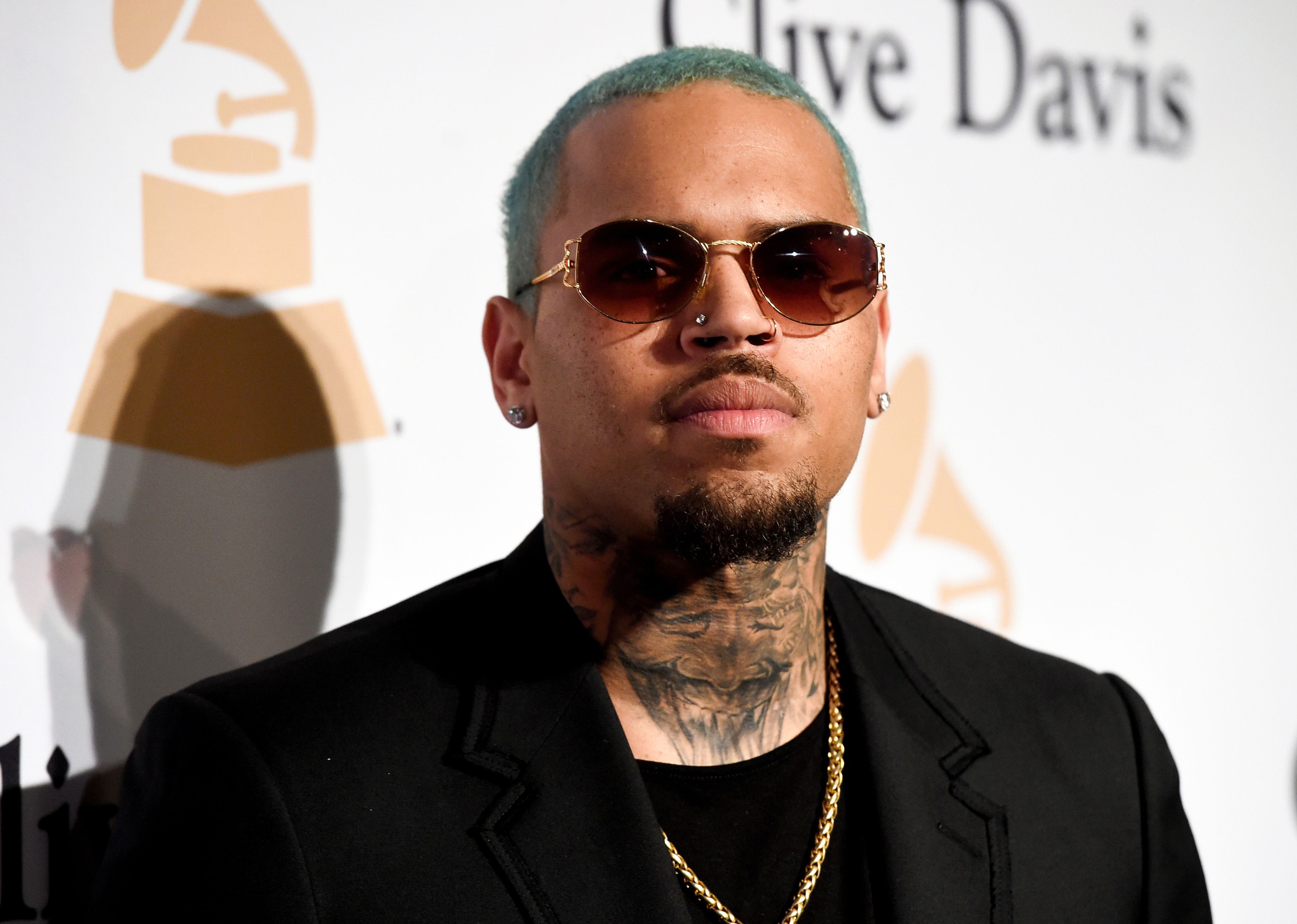 BEVERLY HILLS, CA - FEBRUARY 07:  Recording artist Chris Brown attends the Pre-GRAMMY Gala and Salute To Industry Icons honoring Martin Bandier at The Beverly Hilton Hotel on February 7, 2015 in Beverly Hills, California.  (Photo by Jason Merritt/Getty Images)