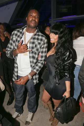 LBD With Flavor - Sometimes the occasion calls for an itty-bitty black dress and Nicki's hits the mark. Meek does chill next to his lady at the 2015 official Grammy party.  (Photo: Johnny Nunez/WireImage)