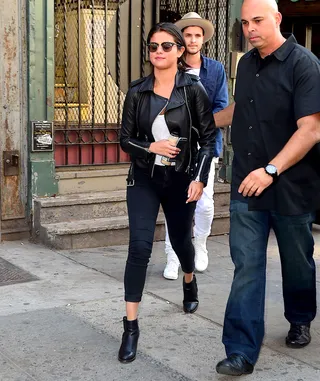 Selena Gomez - A moto jacket is perfect for battling the unpredictable weather of spring. Selena Gomez recently rocked hers out with a retro androgynous look while attending Hillsong Church in New York City. (Photo: 247PAPS.TV / Splash News)