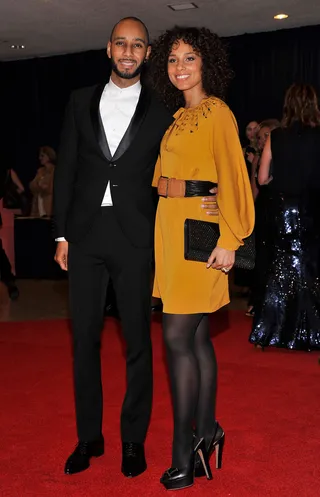 Swizz Beatz and Alicia Keys - Swizz suited up nicely while Alicia worked a mustard Diane von Furstenberg dress paired with tights and Valentino heels.  (Photo: Stephen Lovekin/Getty Images)