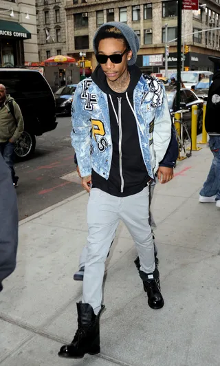 Street Chic - Rapper Wiz Khalifa looks more London punk than Pittsburgh rapper as he arrives at his hotel in New York. The "Black and Yellow" emcee recently released a new mixtape called Taylor Allderdice.&nbsp;&nbsp;(Photo: Hall/Pena, PacificCoastNews.com)
