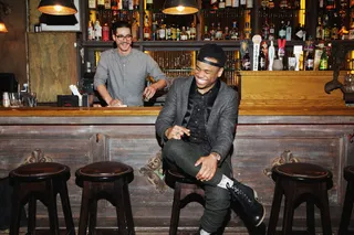 His First Love - Mack&nbsp;sits back and enjoys a laugh at the bar inside&nbsp;Kingston Hall and reveals his first love: music.   “It was mainly just finding the right time to devote to music and attack it the way that I wanted to.”   (Photo: Jeaneen Lund / BET)  Topman blazer $300 @ Topman.com, Richard Chai slouchy creased trouser $282 @ Odin NY, 10 Deep black mallard button up shirt $96 @ 10deep.com, Nice kicks custom socks @ Rock Em Apparel, Andrew Marc forest boot $248 @ Andrewmarc.com, 40oz NYC Black on Black "NY" snapback $40 @ 40ozny.com, Rolex watch - Rose gold Rolex Day Date II @ DWS Jewelry &amp; Co