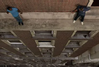 It Only Gets Realer - Apparently Kevin thought it would be a good idea to step outside on the ledge of the building to take a leak. Now he's fearing for his safety. Duane steps out to try and help him. (Photo: BET)&nbsp;