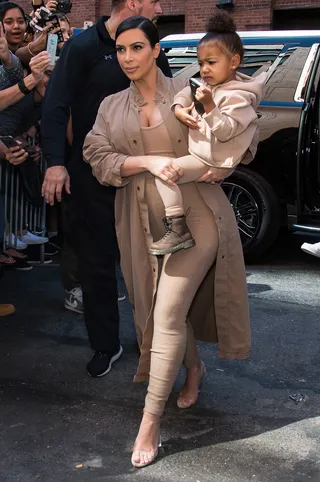 Family - Kim and Nori arrive at the show.&nbsp;&nbsp;(Photo: Gilbert Carrasquillo/FilmMagic)