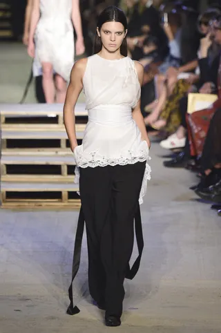 Givenchy&nbsp; - This white lace bodice paired with a long fitted skirt gives us old fashioned grace without feeling stuffy and boxed in.&nbsp;(Photo: Frazer Harrison/Getty Images)