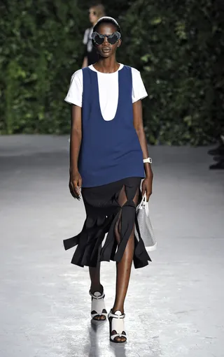 Opening Ceremony - School is in with this this multicolored tee paired with this black cut away skirt.(Photo: Arun Nevader/Getty Images)