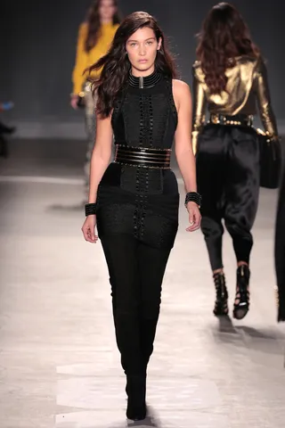 Bella Hadid - The model of the moment and younger sister to Gigi Hadid struts the runway at the BALMAIN X H&amp;M Collection launch in a fierce design.(Photo: Randy Brooke/Getty Images for H&amp;M)