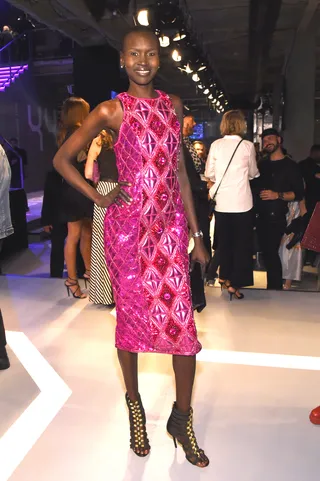 Alek Wek - The supermodel flosses on 'em in a beautiful jewel tone dress from the collection.(Photo: Larry Busacca/Getty Images for H&amp;M)