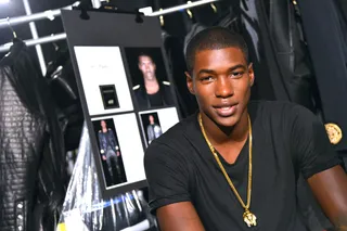 Ronald Epps - The male model preps backstage at the show before the big reveal. Who will be making him their next #MCM?(Photo: Slaven Vlasic/Getty Images for H&amp;M)