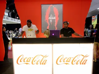 Coke DJ Booth - DJ Dris and a fellow DJ collaborate on the ones and twos to keep the guests partying.  (Photo by Marc Davis/PictureGroup)