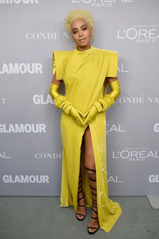 Boho Chic - The Houston native went boho in this head-to-toe Chloe ensemble at the label's fashion show in Paris. The Don't Touch My Hair singer was serving summer chic in this embroidered lace dress that she paired with camel-colored heels and a buttery brown leather clutch. (Photo: Dominique Charriau/WireImage)