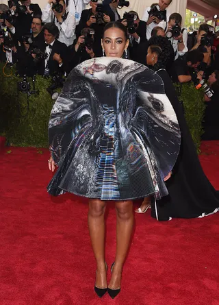 Lemonade - The 32-year-old set social media ablaze after she showed up to the 2016 Met Gala in this bold lemon&nbsp;yellow dress by David Laport. Many took it as a subliminal message of support for her big sister after the previous year's iconic elevator fight. (Photo: Karwai Tang/WireImage)