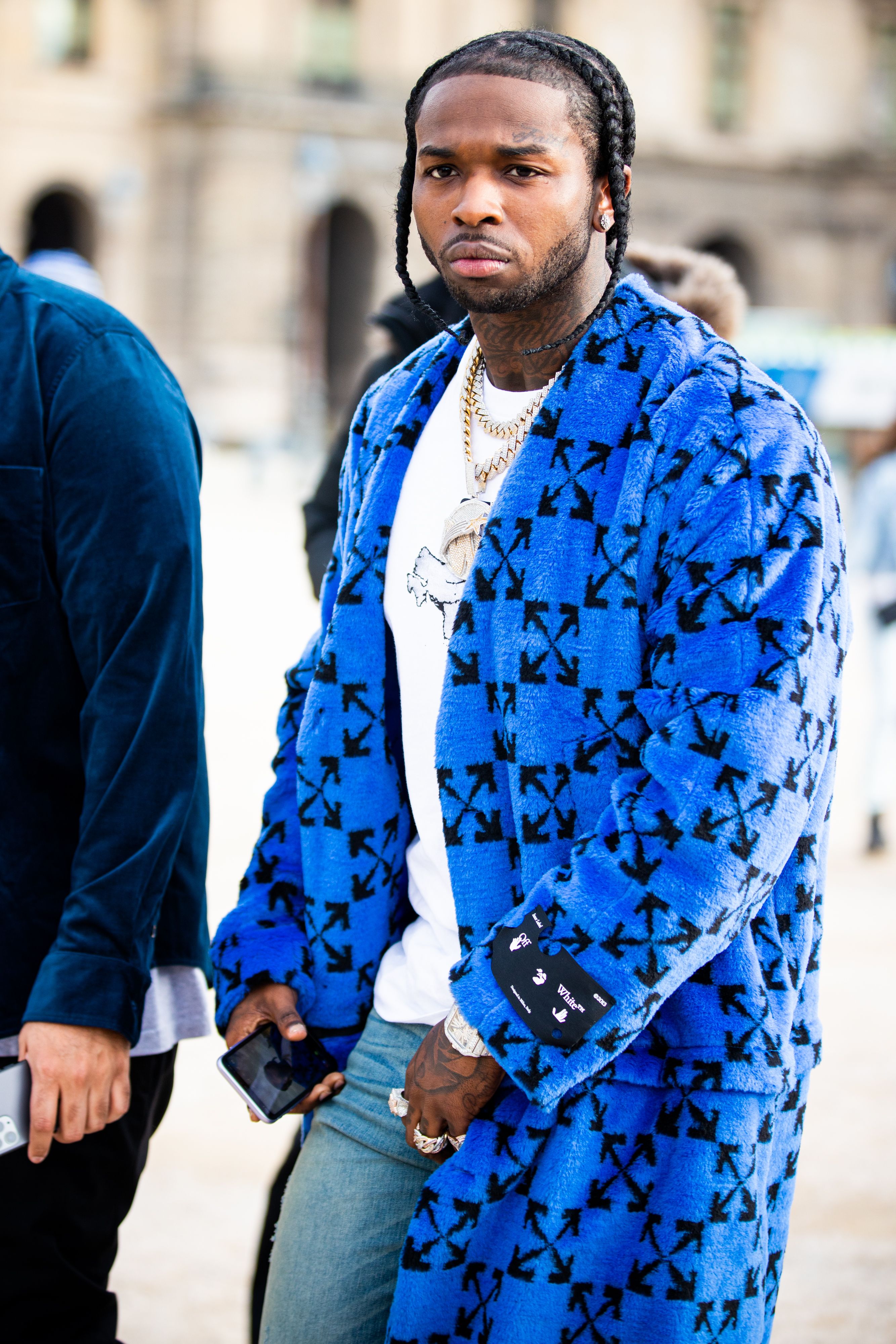 PARIS, FRANCE - JANUARY 15: Rapper Pop Smoke attend the Off-White Menswear Fall/Winter 2020-2021 show as part of Paris Fashion Week on January 15, 2020 in Paris, France. (Photo by Claudio Lavenia/Getty Images)