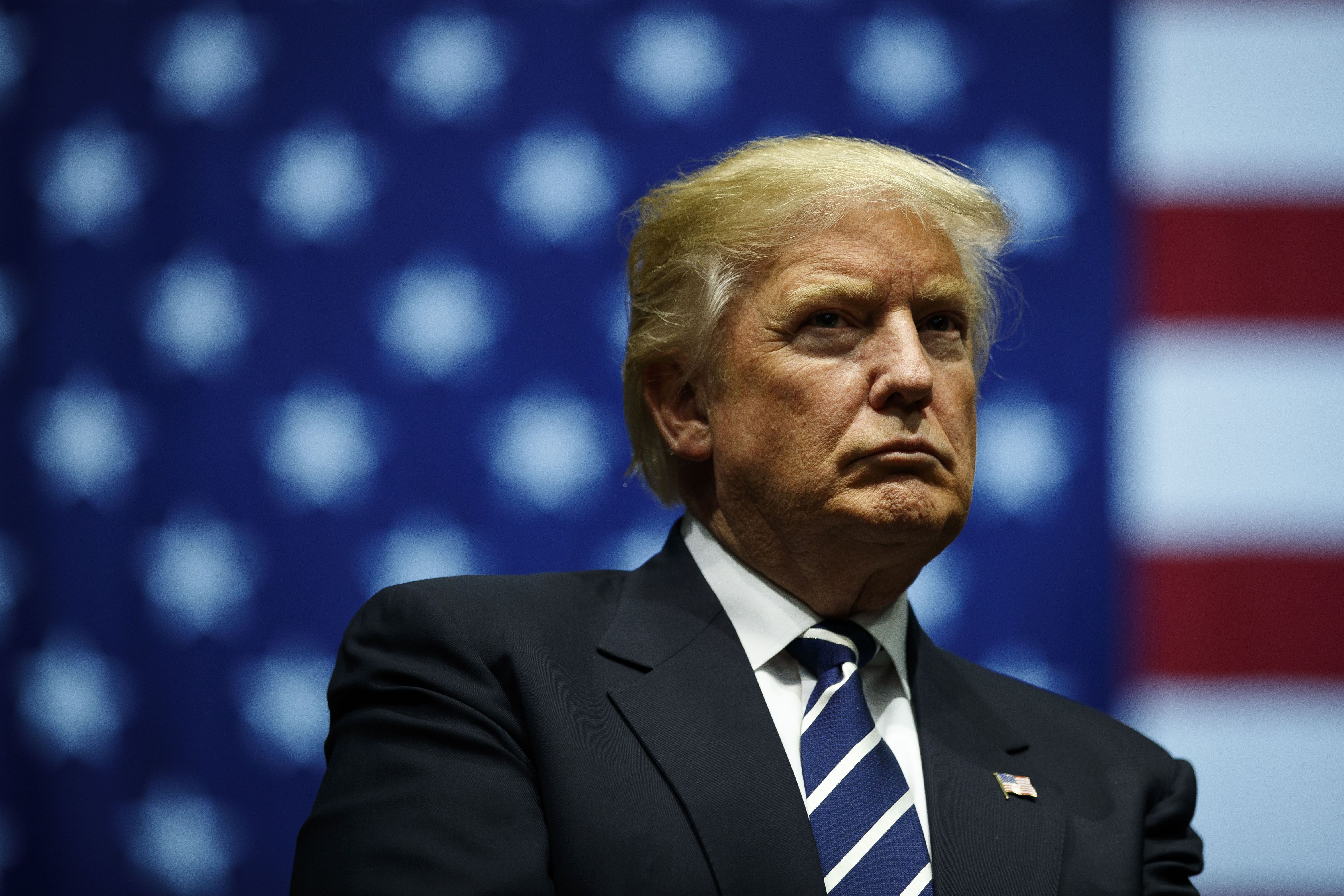 GRAND RAPIDS, MI - DECEMBER 9: President-elect Donald Trump looks on during a rally at the DeltaPlex Arena, December 9, 2016 in Grand Rapids, Michigan. President-elect Donald Trump is continuing his victory tour across the country. (Photo by Drew Angerer/Getty Images)