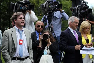 Neil Munro - &quot;Why do you favor foreigners over American workers?&quot; Daily Caller reporter Neil Munro shouted at the president during his Rose Garden press conference last Friday. He was ultimately shut down by Obama and later criticized for heckling the president about his shift on immigration policy.(Photo: Alex Wong/Getty Images)