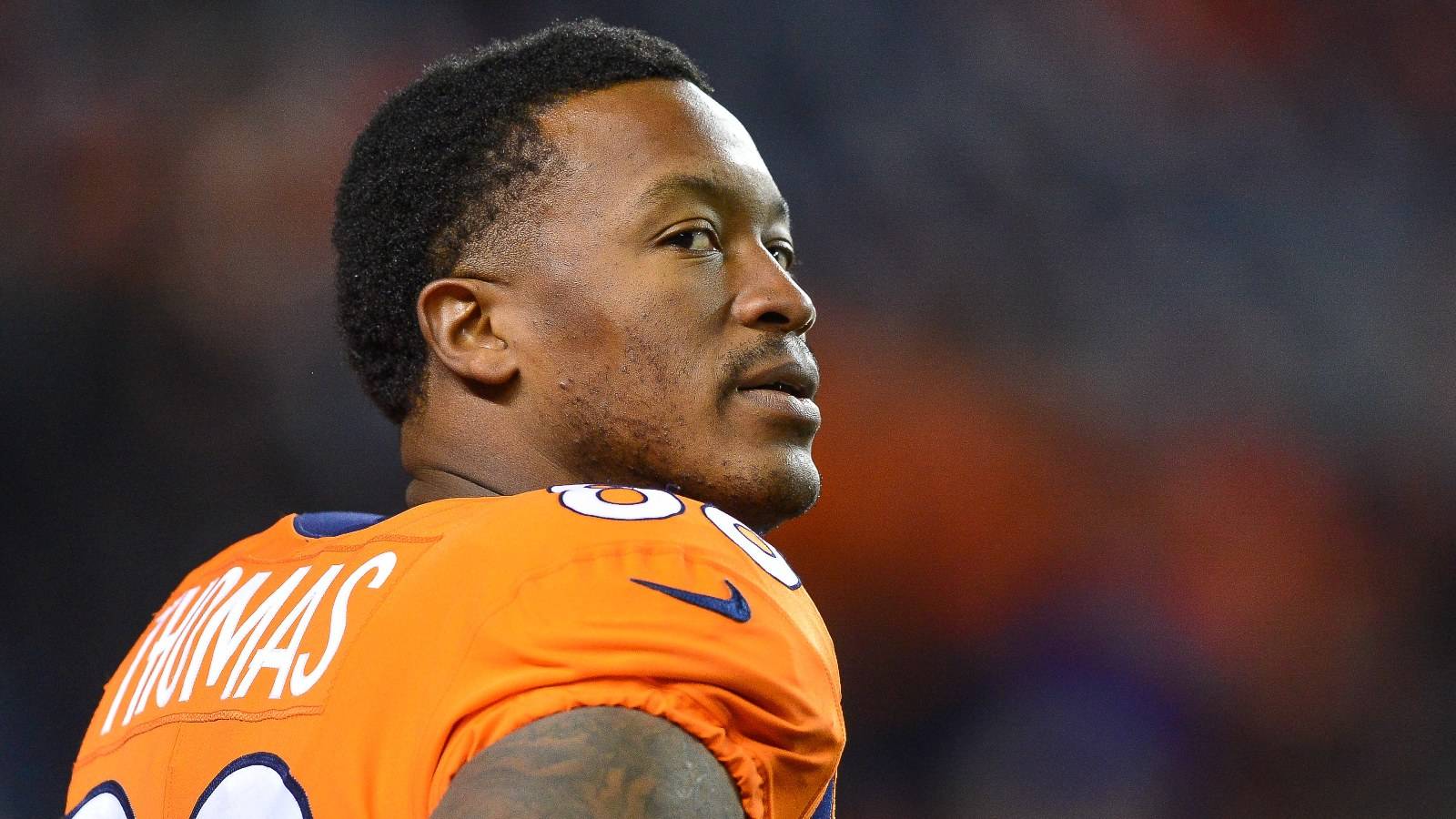 Wide receiver Demaryius Thomas #88 of the Denver Broncos looks on as players warm up on the field before a game at Sports Authority Field at Mile High on November 12, 2017 in Denver, Colorado. 