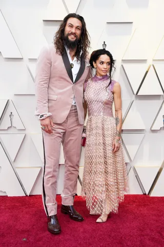 Jason Momoa and Lisa Bonet&nbsp;in matching custom Karl Lagerfeld. - (Photo: Frazer Harrison/Getty Images)&nbsp;