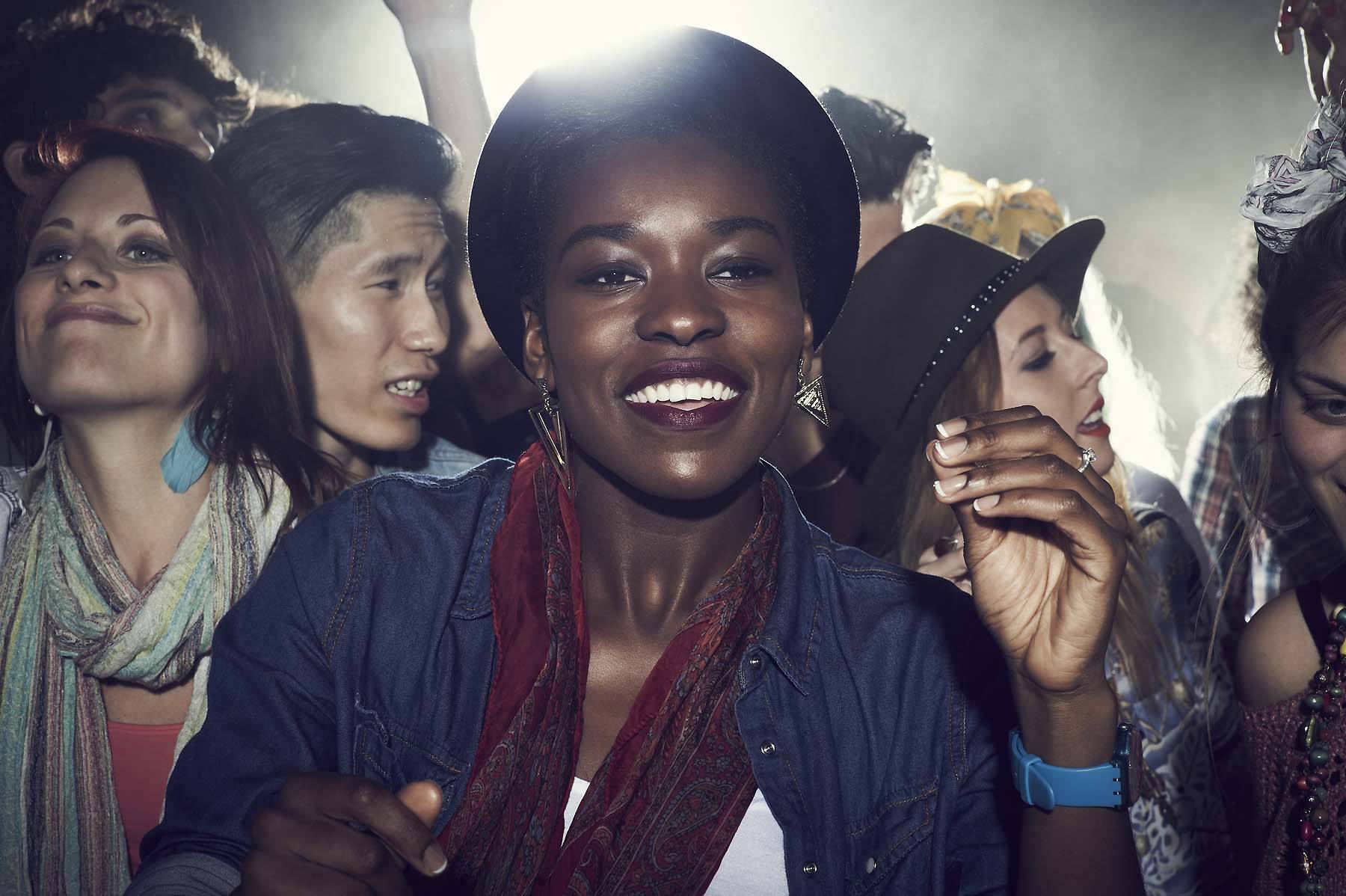 happy woman in crowd