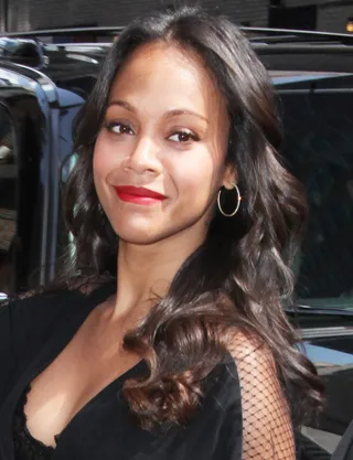 Zoe Saldana  - Zoe pairs her long curls with a fierce lip and incomparable pregnancy glow — such a beauty!  (Photo: PNP/WENN.com)