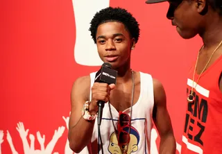 Sweet Victory - Wild Out Wednesday contestant Lil Quan chops it up a bit after winning W.O.W. on 106.(Photo by Bennett Raglin/Getty Images for BET)