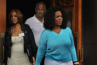 /content/dam/betcom/images/2011/07/Celebs-07.01-07.15/071211-celebs-oprah-stedman-gayle.jpg