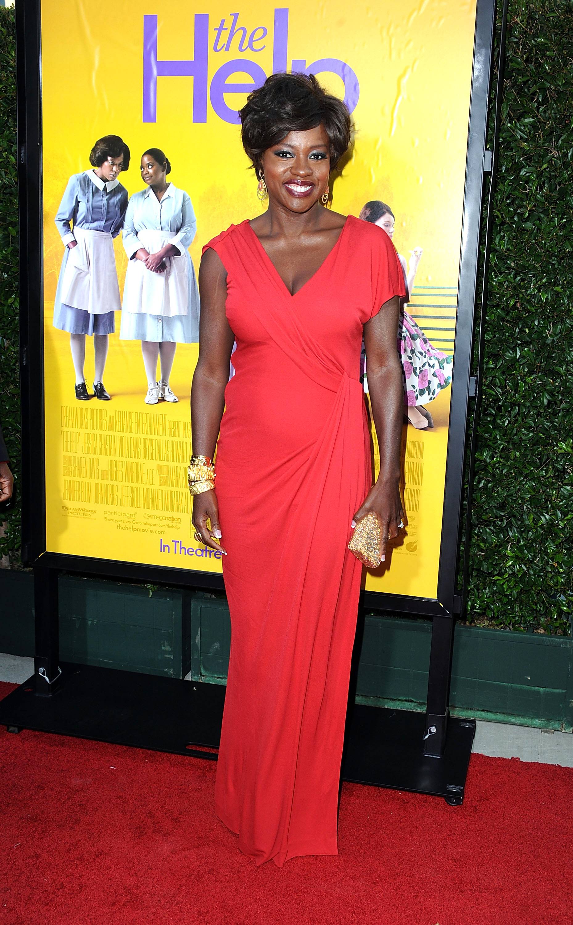 Viola Davis - The actress goes for high-wattage style in a bold orange Escada gown.(Photo: Frazer Harrison/Getty Images)