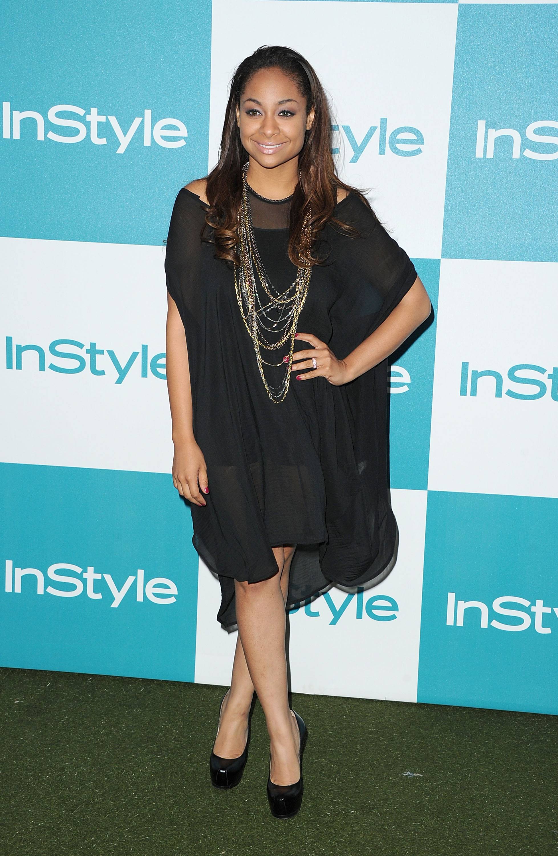 Raven-Symone - The young star breezed through the 10th Annual InStyle Summer Soiree, showing off a black sheer tunic, pumps and layered accessories.(Photo: Jason Merritt/Getty Images)