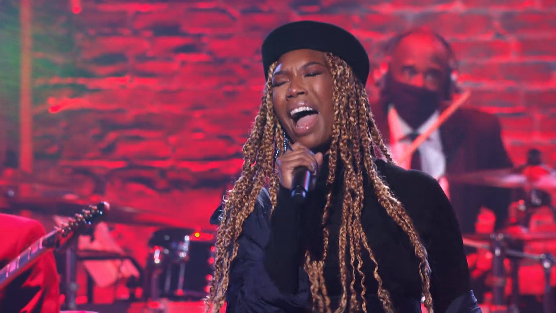 Brandy performs at the BET Soul Train Awards 2020.