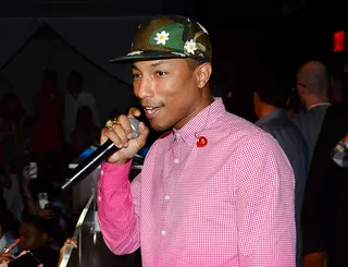 Flower Power - We love a man that’s comfortable enough in his masculinity to rock whatever he wants. Daisies on a camo-print fitted? All in a day’s work for him.  (Photo: Ethan Miller/Getty Images for PURE Nightclub)