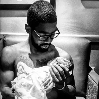 Uncle Usher - Usher's little brother just became a dad and he couldn't be happier.&nbsp;(Photo: Kyrie Irving via Instagram)